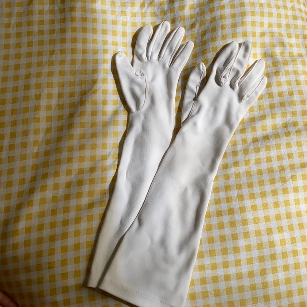 Elbow length white gloves